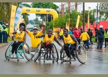 Richard Ocira and Pauline Achai Shine at The MTN Kampala Marathon Wheelchair Race