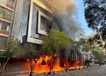 Investigate burning of Uganda House in Kenya