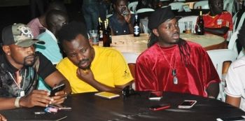 City Fashionistas Kim Swagg, Abryans And William Bugembe Share One Bottle Of Beer At Gravity Omutujju Concert