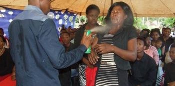 Pastor Sprays DOOM on congregants to Heal them