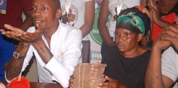 Video: Tycoon Brian White Donates UGX 25m In Cash To Mowzey Radio