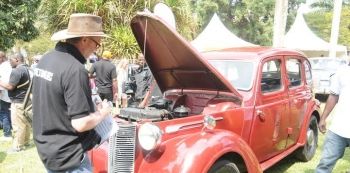 Vintage car show drives in the enthusiasts
