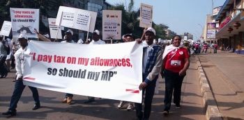 Citizens march against MPS’ Income tax Bill- Photos
