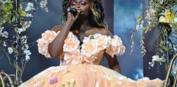 Video: Rema Gets Emotional On Stage, Drops Into Tears