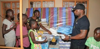 TMT’s Cameroon Gitawo Donates to the Triplets Foundation.