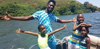 Singer Bobi Wine On Family Holiday With Kids In Bulago Island [Pics]