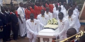 Body of Lawrence Mukiibi arrives at Rubaga Cathedral for Requiem Mass
