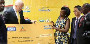 MTN Hands over 500m from 2015 Marathon to KCCA