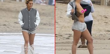 Rita Ora Flashes Her Breasts At Photographers On The Beach In Malibu