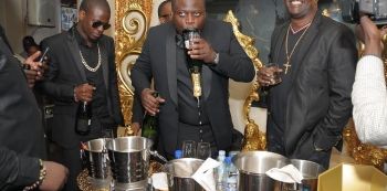 Ivan Ssemwanga Showcases Village Skills While Drinking champagne