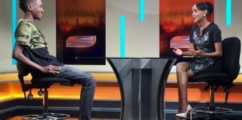 A Pass Appears On Kenyan Television For An Interview In SLIPPERS