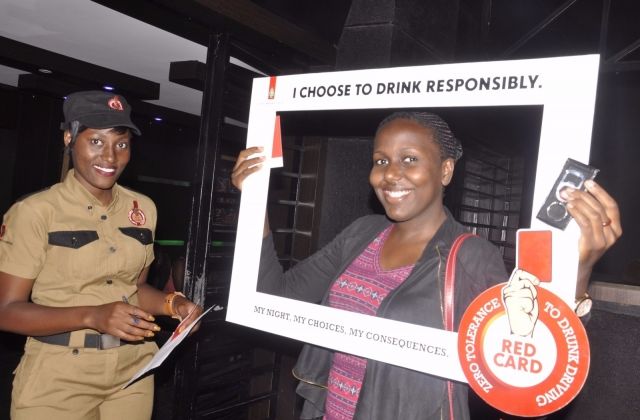 UBL Takes Red Card Drive To Kampala Nightspots