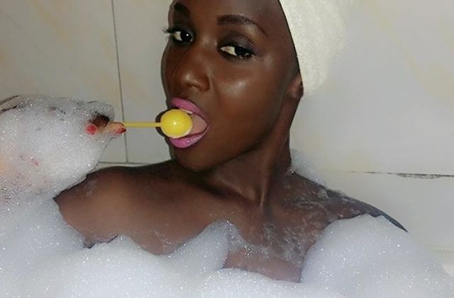 Singer Minah Izah Attempts A Nude Photo Selfie In A Bathroom
