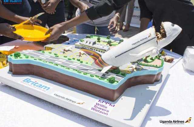 Britam Uganda Hands Over Winning Cake From The #BritamBakeOff Challenge To Uganda Airlines