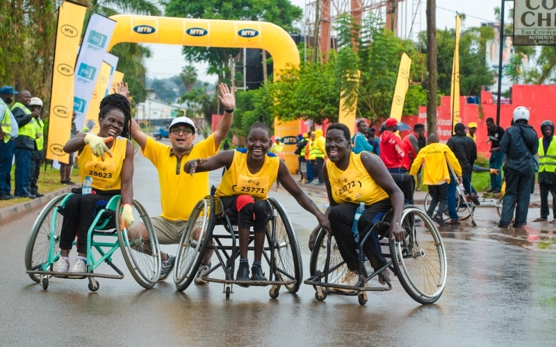 Richard Ocira and Pauline Achai Shine at The MTN Kampala Marathon Wheelchair Race