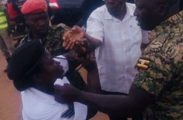 Ugandans demand Justice after UPDF officers’ attack on traffic police woman