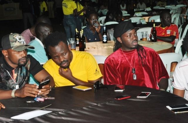 City Fashionistas Kim Swagg, Abryans And William Bugembe Share One Bottle Of Beer At Gravity Omutujju Concert