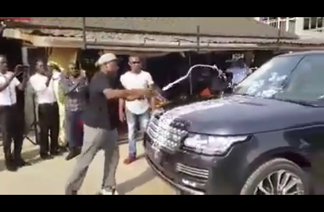 City Tycoon Jack Pemba Washes Car With Champagne, Dry Cleans It With Dollar Bills — Video