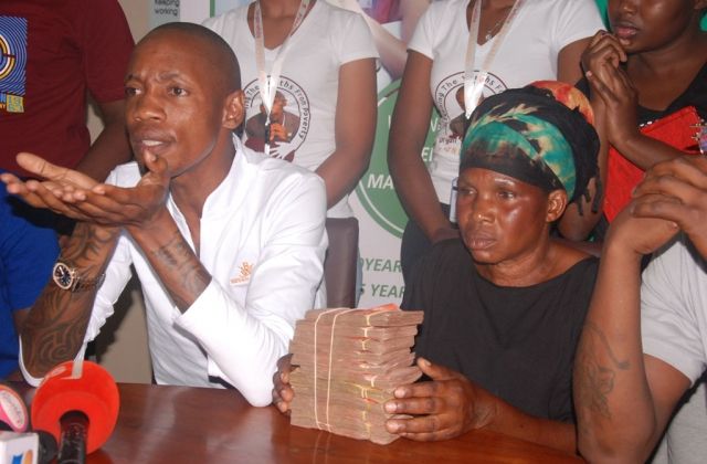 Video: Tycoon Brian White Donates UGX 25m In Cash To Mowzey Radio