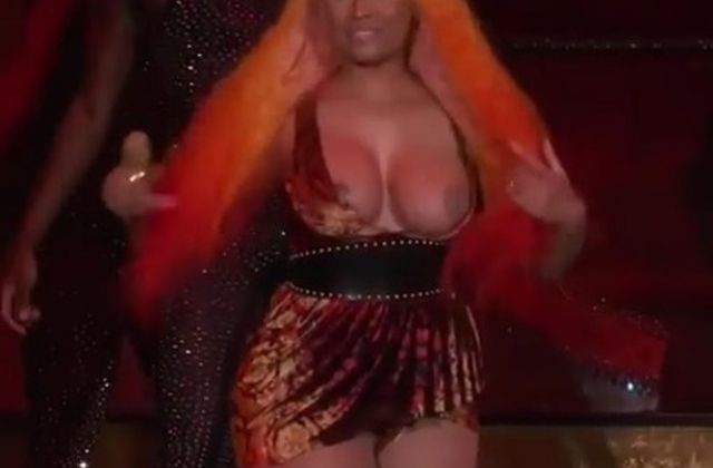 Nicki Minaj's boobs slipped out of dress while performing