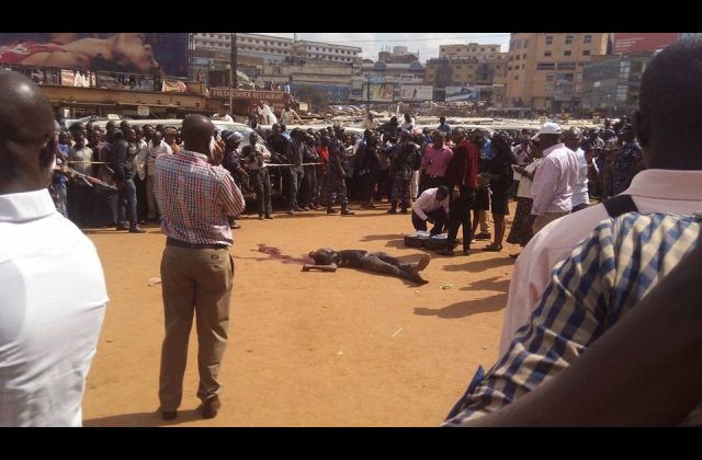 Disturbing Photos! Man Shot Dead For Trying To Grab A Gun From A Police Officer.