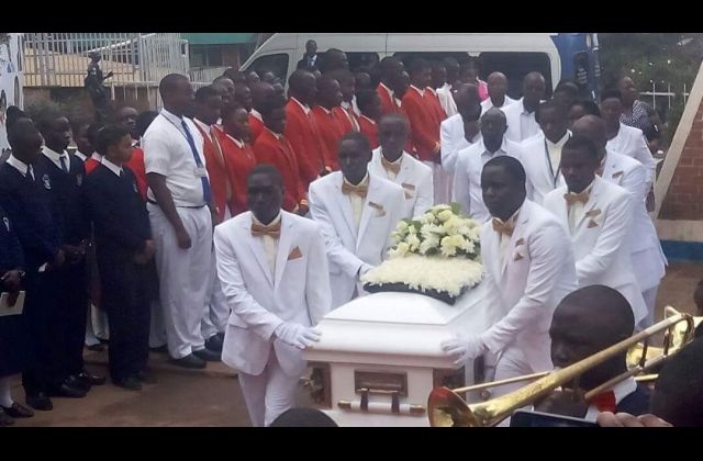 Body of Lawrence Mukiibi arrives at Rubaga Cathedral for Requiem Mass