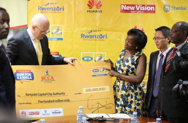 MTN Hands over 500m from 2015 Marathon to KCCA
